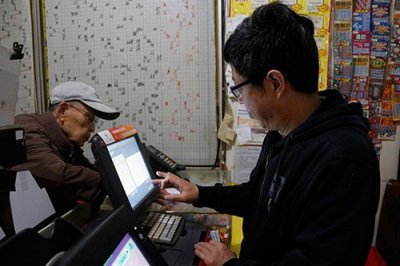 ​11选5北京上市满一年 探访京城首个“万元户”诞生地