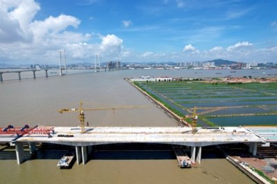 ​南中高速全线连续刚构桥梁全部合龙，计划明年建成